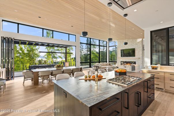 Dining room, Fireplace, Interior, Kitchen, Living room, Pendant Lights, Recessed Lighting, Wooden Ceilings, Wood Texture Flooring