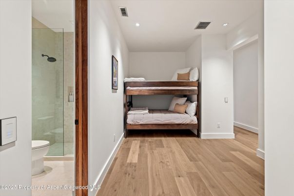 Bathroom, Bedroom, Glass Shower, Interior, Recessed Lighting, Wood Texture Flooring