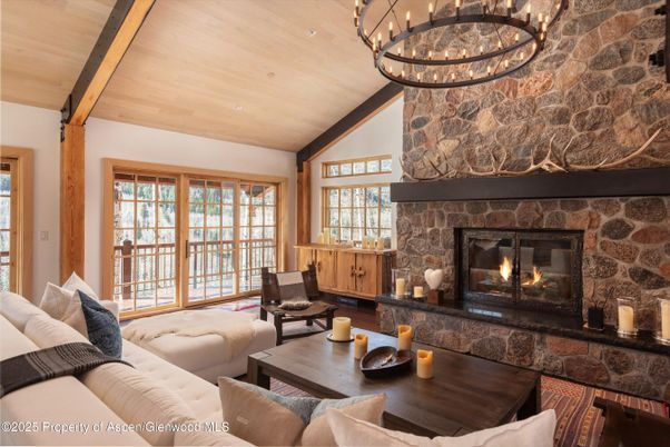 Chandelier, Fireplace, Interior, Living room, Stone Walls, Wooden Beams, Wooden Ceilings