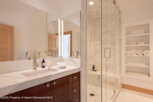 Bathroom, Dual Sink Vanities, Glass Shower, Interior, Marble Walls, Recessed Lighting