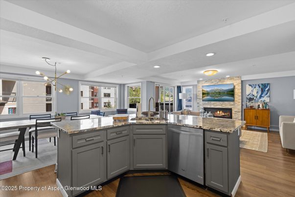 Dining room, Fireplace, Interior, Kitchen, Pendant Lights, Recessed Lighting, Stone Walls, Wood Texture Flooring