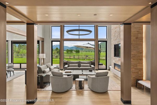 Fireplace, Interior, Living room, Pendant Lights, Recessed Lighting, Stone Walls, Wooden Ceilings, Wood Texture Flooring