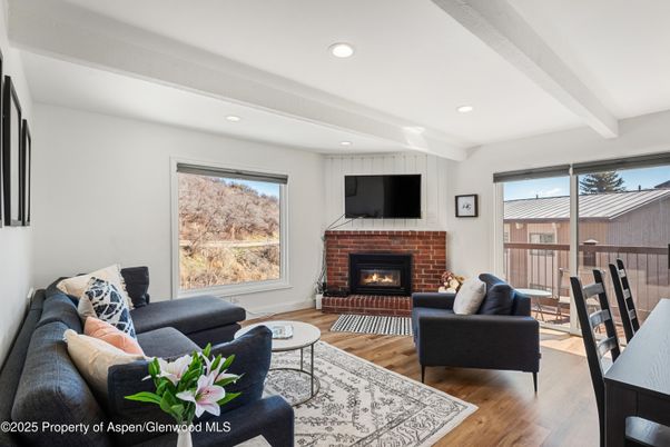 Fireplace, Interior, Living room, Recessed Lighting, Wood Texture Flooring