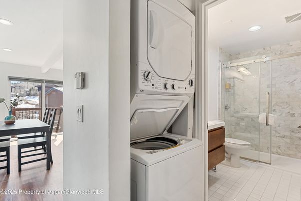 Bathroom, Glass Shower, Interior, Marble Walls, Recessed Lighting, Utility Closets, Washer