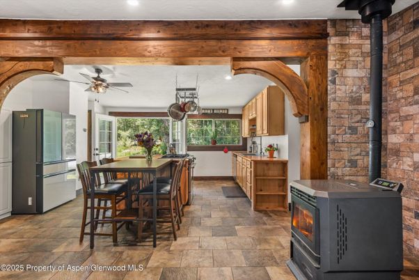 Dining room, Fireplace, Interior, Kitchen, Recessed Lighting, Stone Walls