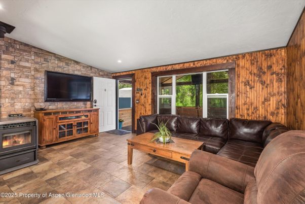 Fireplace, Interior, Living room, Recessed Lighting, Stone Walls, Wooden Walls