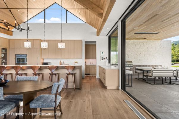 Dining room, Interior, Kitchen, Pendant Lights, Recessed Lighting, Stainless Steel Appliances, Stone Walls, Wooden Beams, Wooden Ceilings, Wood Texture Flooring