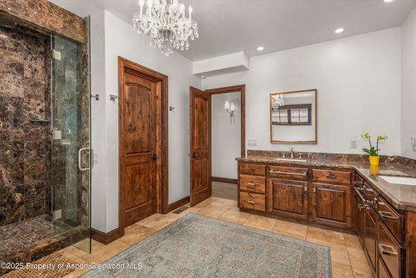 Bathroom, Chandelier, Dual Sink Vanities, Glass Shower, Interior, Recessed Lighting
