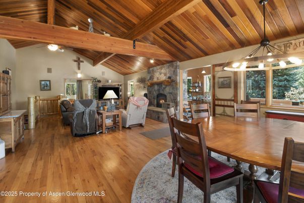 Dining room, Fireplace, Interior, Living room, Pendant Lights, Wooden Beams, Wooden Ceilings, Wood Texture Flooring