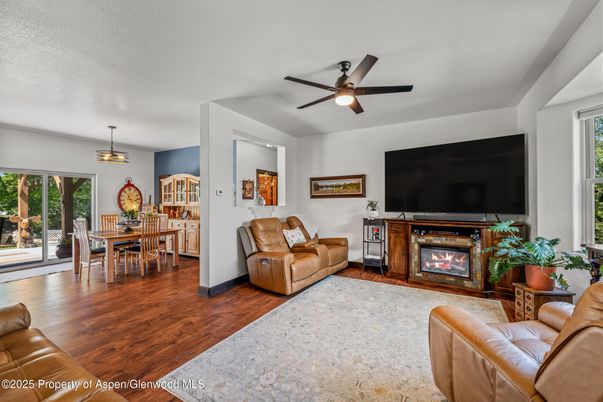 Dining room, Fireplace, Interior, Living room, Pendant Lights, Wood Texture Flooring