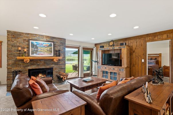 Fireplace, Interior, Living room, Recessed Lighting, Stone Walls, Wooden Walls