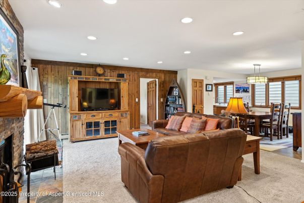 Dining room, Fireplace, Interior, Living room, Pendant Lights, Recessed Lighting, Wooden Walls