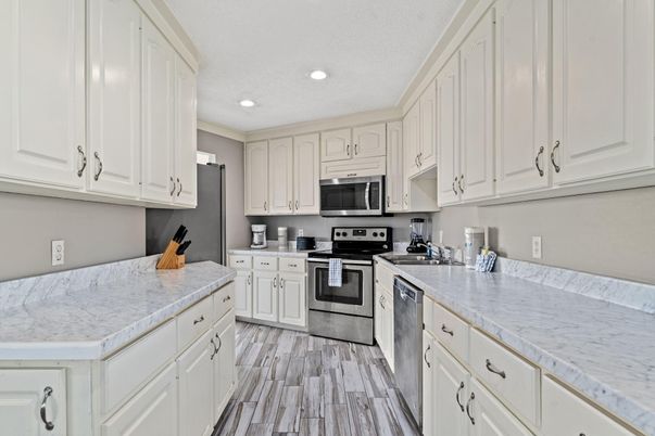 Interior, Kitchen, Recessed Lighting, Stainless Steel Appliances, Wood Texture Flooring