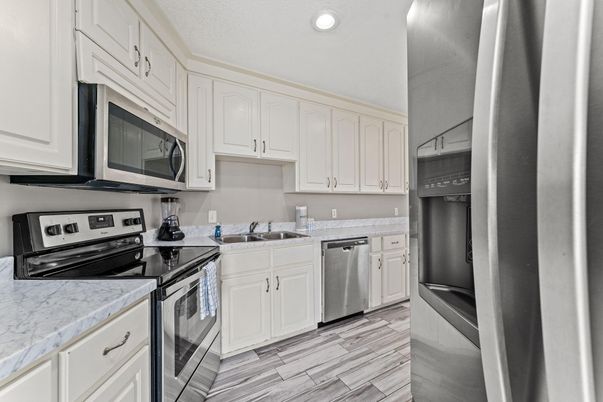 Interior, Kitchen, Recessed Lighting, Stainless Steel Appliances, Wood Texture Flooring