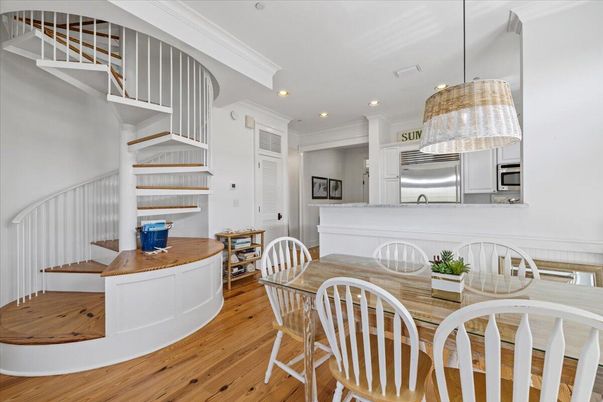 Dining room, Interior, Kitchen, Pendant Lights, Recessed Lighting, Stainless Steel Appliances, Wood Texture Flooring