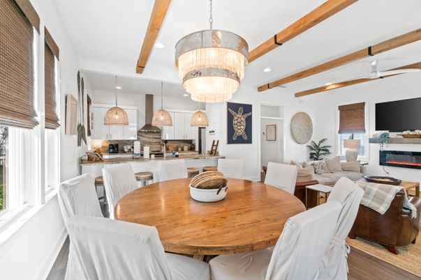 Chandelier, Dining room, Interior, Kitchen, Living room, Pendant Lights, Recessed Lighting, Stainless Steel Appliances, Wooden Beams, Wood Texture Flooring