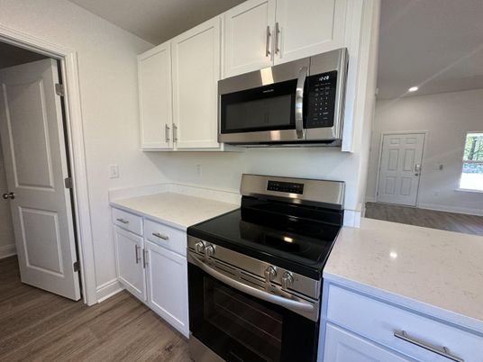 Interior, Kitchen, Recessed Lighting, Stainless Steel Appliances, Wood Texture Flooring