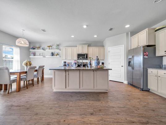 Chandelier, Dining room, Interior, Kitchen, Recessed Lighting, Stainless Steel Appliances, Wood Texture Flooring