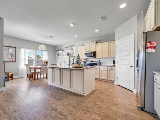 Chandelier, Dining room, Interior, Kitchen, Pendant Lights, Recessed Lighting, Stainless Steel Appliances, Wood Texture Flooring
