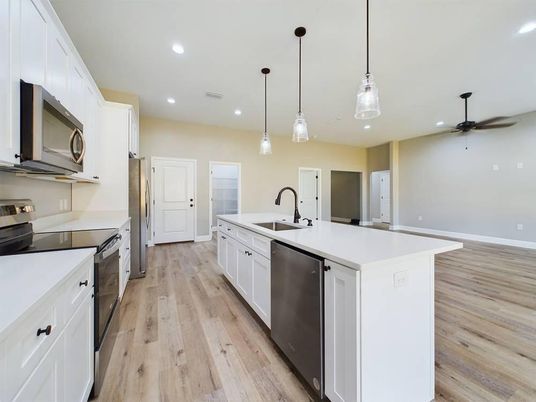 Interior, Kitchen, Pendant Lights, Recessed Lighting, Stainless Steel Appliances, Wood Texture Flooring
