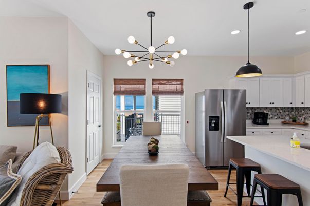 Dining room, Interior, Kitchen, Pendant Lights, Recessed Lighting, Stainless Steel Appliances, Wood Texture Flooring