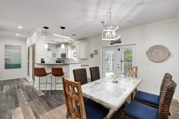 Dining room, Interior, Kitchen, Pendant Lights, Recessed Lighting, Stainless Steel Appliances, Wood Texture Flooring