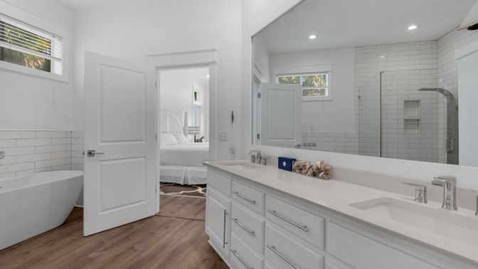Bathroom, Bedroom, Dual Sink Vanities, Free Standing Baths, Glass Shower, Interior, Recessed Lighting, Wood Texture Flooring