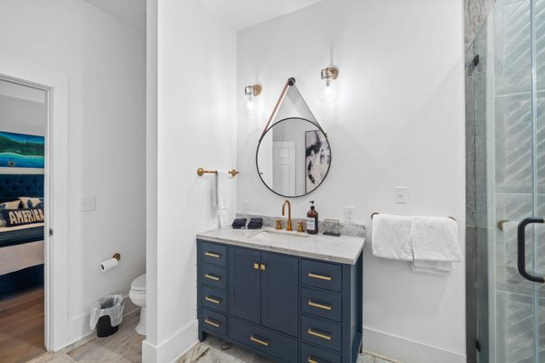 Bathroom, Dual Sink Vanities, Glass Shower, Interior, Wood Texture Flooring