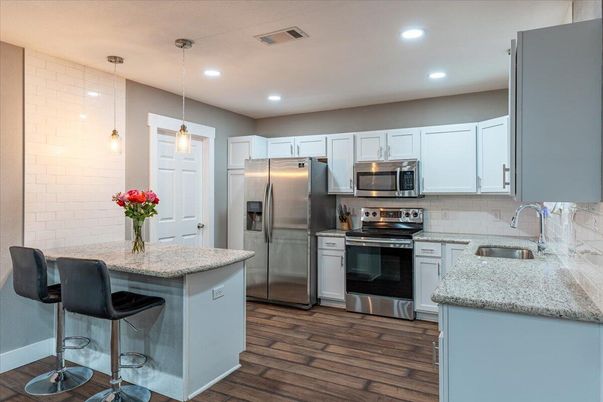 Interior, Kitchen, Pendant Lights, Recessed Lighting, Stainless Steel Appliances, Wood Texture Flooring