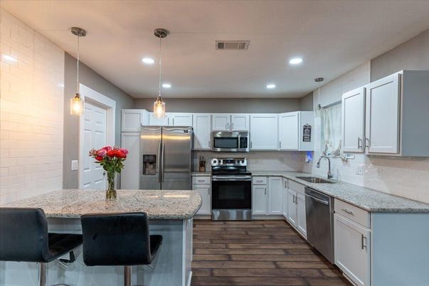 Interior, Kitchen, Pendant Lights, Recessed Lighting, Stainless Steel Appliances, Wood Texture Flooring