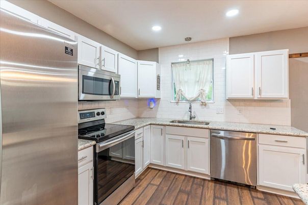 Interior, Kitchen, Recessed Lighting, Stainless Steel Appliances, Wood Texture Flooring