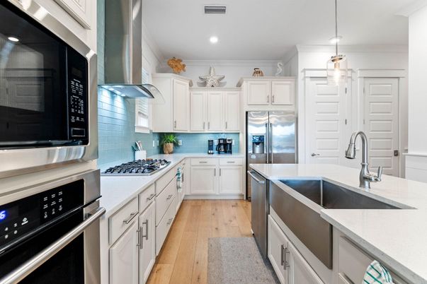 Interior, Kitchen, Pendant Lights, Recessed Lighting, Stainless Steel Appliances, Wood Texture Flooring