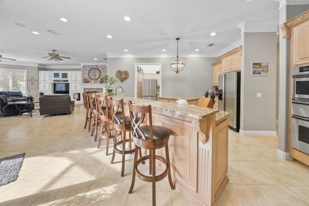 Fireplace, Interior, Kitchen, Living room, Pendant Lights, Recessed Lighting, Stainless Steel Appliances