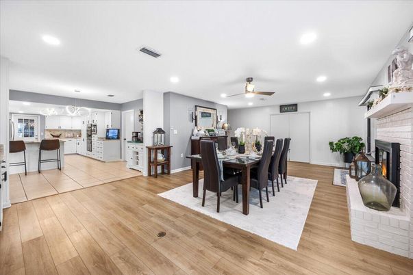 Dining room, Fireplace, Interior, Kitchen, Pendant Lights, Recessed Lighting, Wood Texture Flooring