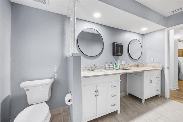 Bathroom, Dual Sink Vanities, Interior, Recessed Lighting, Wood Texture Flooring