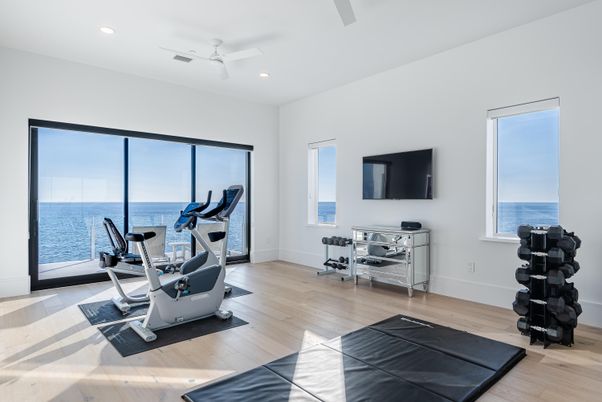 Fitness Equipment, Gym, Interior, Recessed Lighting, Water, Wood Texture Flooring
