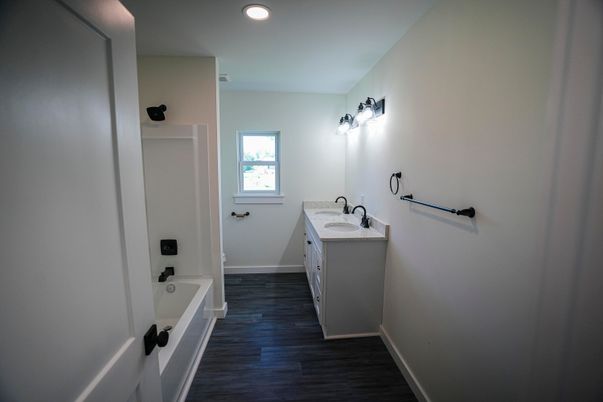 Bathroom, Dual Sink Vanities, Interior, Recessed Lighting, Wood Texture Flooring