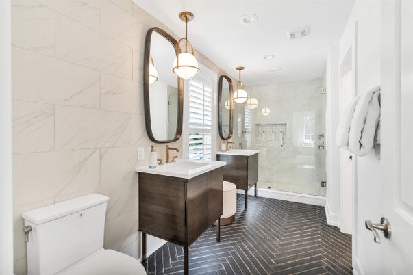Bathroom, Dual Sink Vanities, Glass Shower, Interior, Marble Walls, Pendant Lights, Recessed Lighting