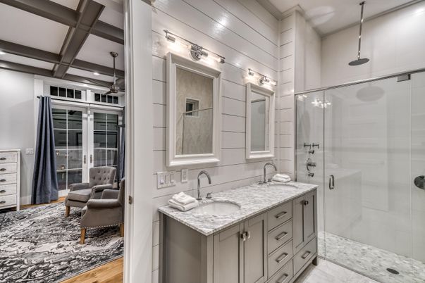 Bathroom, Dual Sink Vanities, Glass Shower, Interior, Recessed Lighting, Wood Texture Flooring