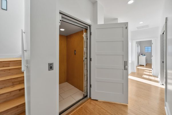 Elevator, Interior, Recessed Lighting, Wood Texture Flooring, Wooden Walls