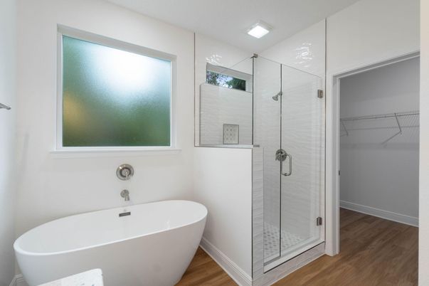 Bathroom, Free Standing Baths, Glass Shower, Interior, Walk-in Closets, Wood Texture Flooring