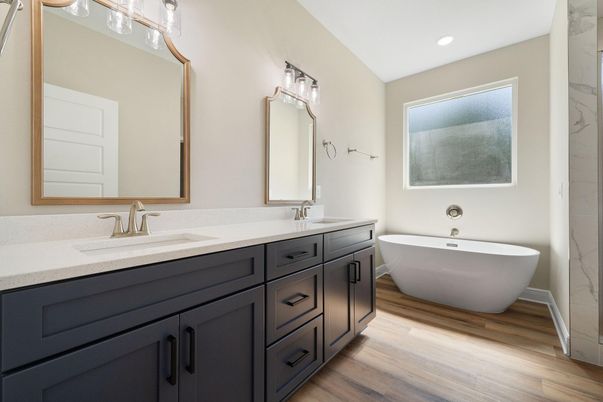 Bathroom, Dual Sink Vanities, Free Standing Baths, Interior, Recessed Lighting, Wood Texture Flooring
