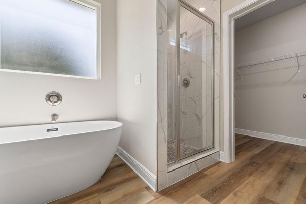 Bathroom, Free Standing Baths, Glass Shower, Interior, Marble Walls, Wood Texture Flooring