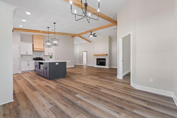 Chandelier, Fireplace, Interior, Kitchen, Pendant Lights, Recessed Lighting, Wooden Beams, Wood Texture Flooring