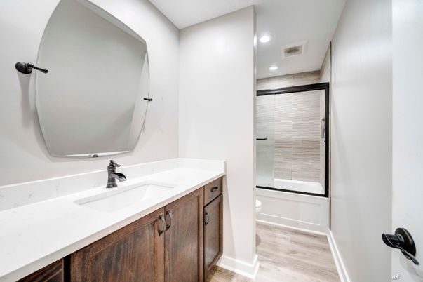 Bathroom, Dual Sink Vanities, Interior, Recessed Lighting, Wood Texture Flooring