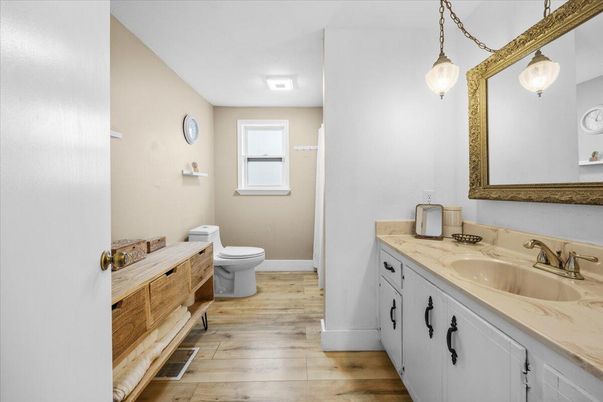 Bathroom, Dual Sink Vanities, Interior, Pendant Lights, Wood Texture Flooring