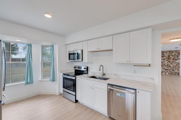 Interior, Kitchen, Recessed Lighting, Stainless Steel Appliances, Wood Texture Flooring