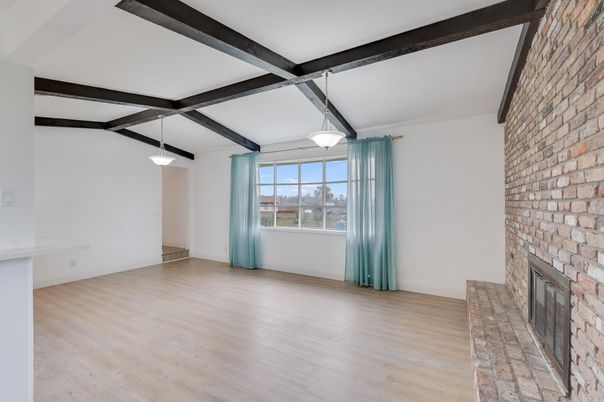 Empty room, Fireplace, Interior, Pendant Lights, Stone Walls, Wooden Beams, Wood Texture Flooring