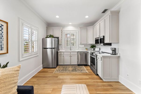 Interior, Kitchen, Recessed Lighting, Stainless Steel Appliances, Wood Texture Flooring