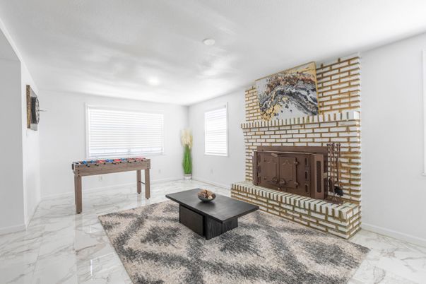 Fireplace, Game Room, Interior, Living room, Marble, Recessed Lighting